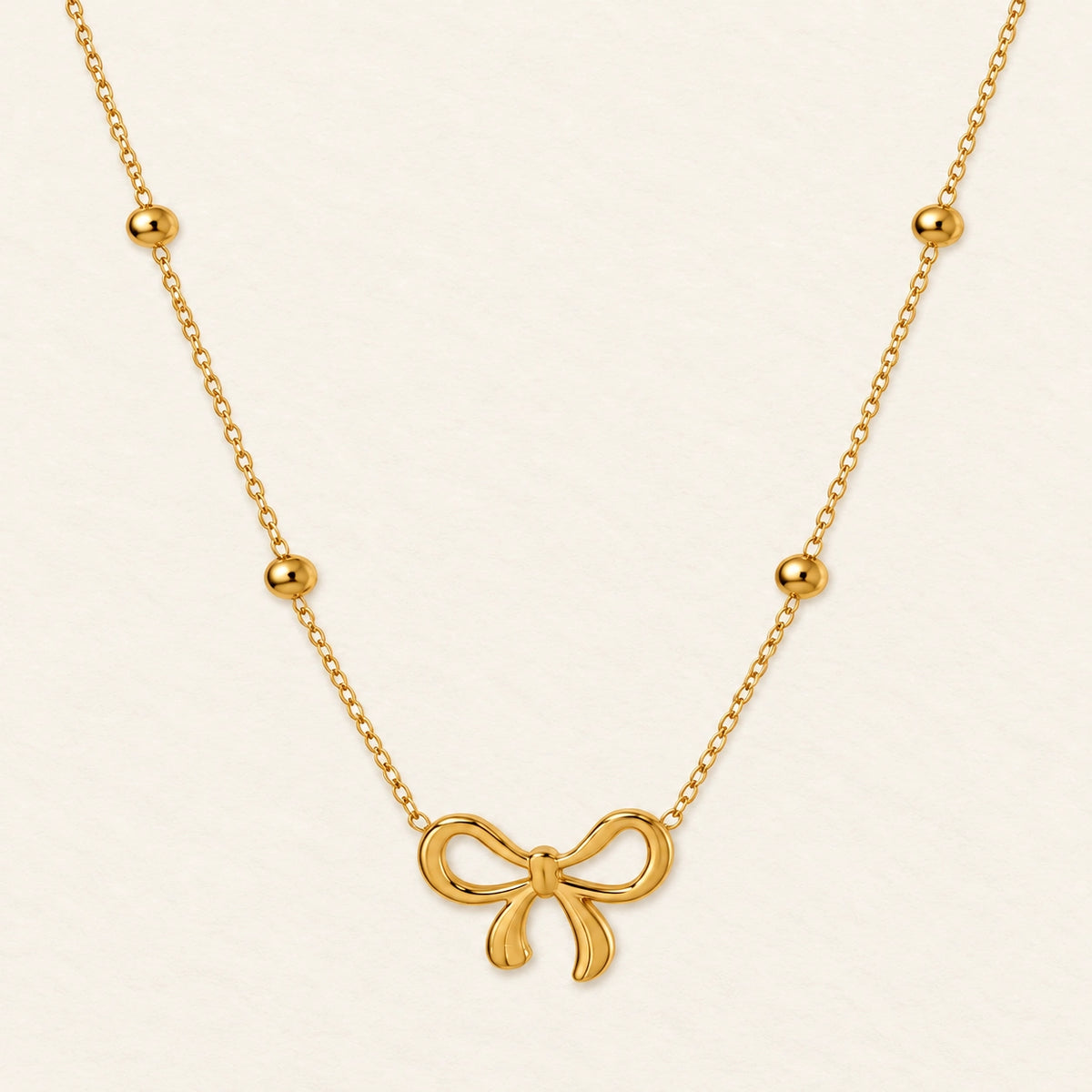 Vesviora Gold Bow Pendant Necklace