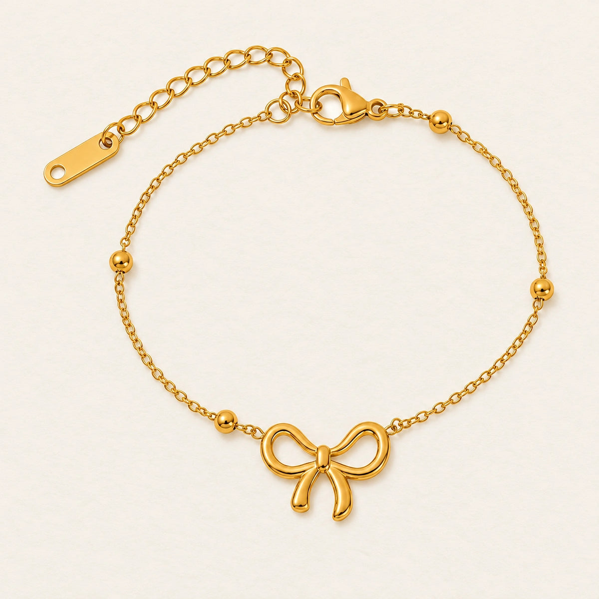 Vesviora Gold Bow Charm Bracelet